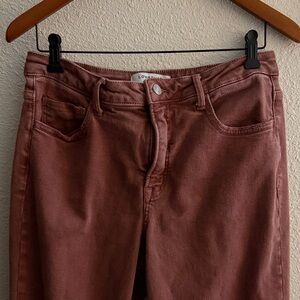 dusty rose / red wash cropped straight leg jeans with fringe